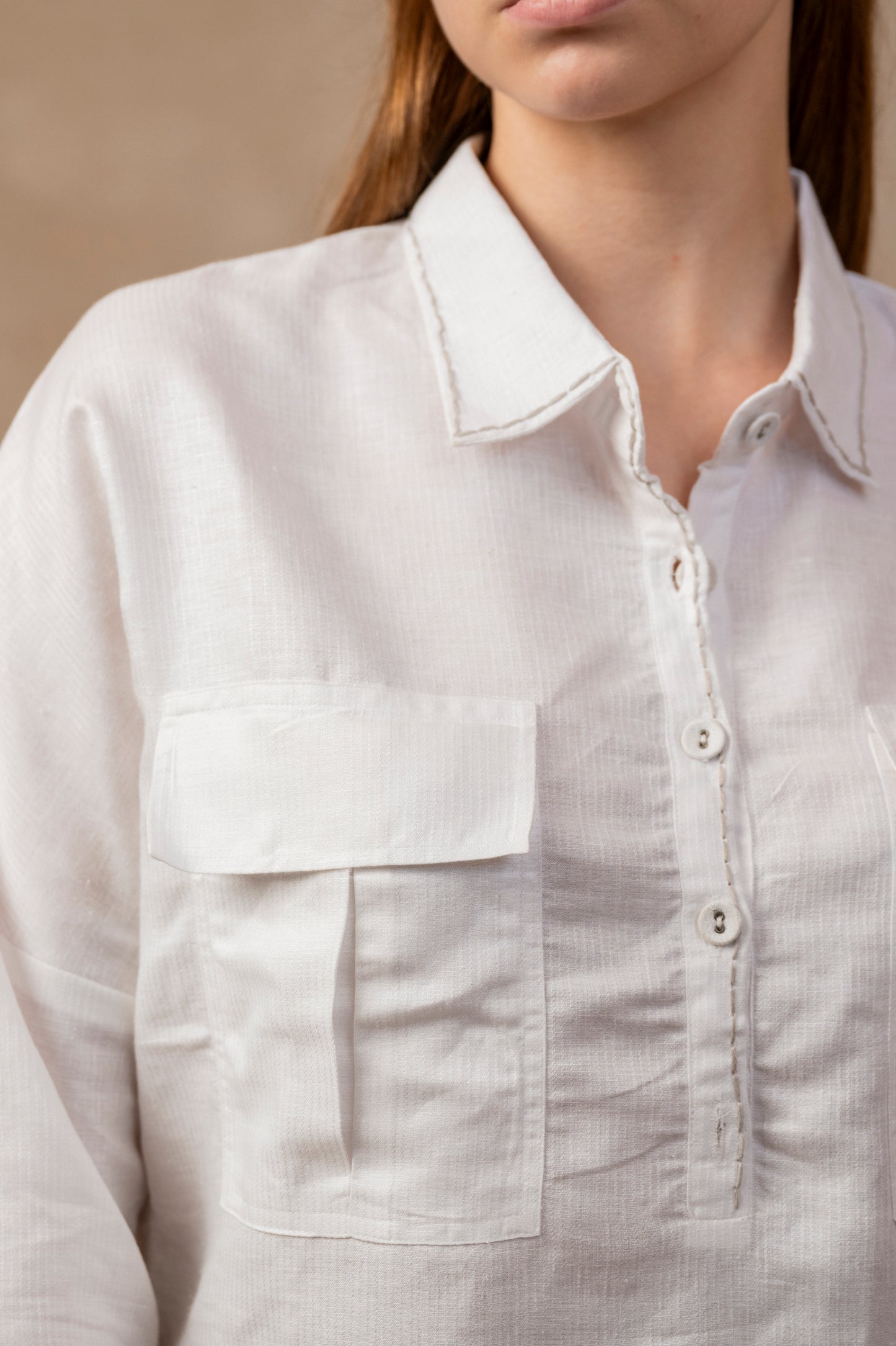Tulua full sleeve Women's shirt, button down, collar, herringbone weave, Pockets, Hemp Fabric, Linen, hand embroidery, sustainable wardrobe, Sustainable Women's Wear, detail view, office wear, formal, close up.