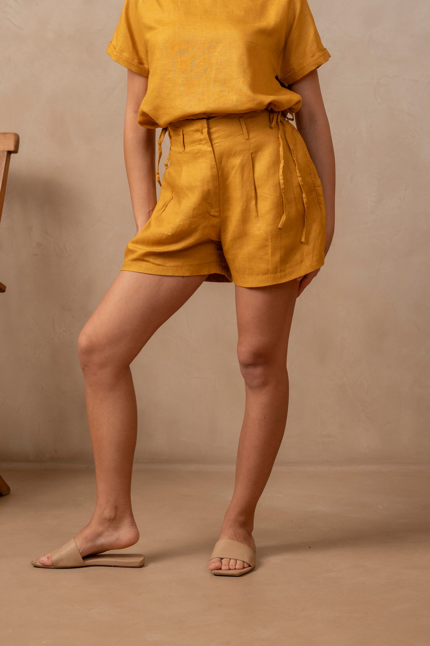 Dhrti | Pleated Shorts in Gold - The Tulua Shop